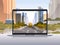 Transparent laptop screen cityscape background realistic gadgets and devices concept