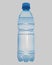 Transparent plastic bottle with mineral water with close blue ca