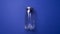 Transparent plastic soda bottle on blue background