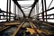 transparent PNG of a Suspension Bridge. passageway wood road. rusty steel metal iron.