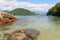 Transparent sea and stones near beach Cotia on island near Parat