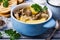 Transparent soup with oyster mushrooms