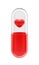 Transparent top red capsule pill object Inside there is a 3D red heart symbol. Health care and medical is heart disease medication