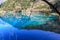 Transparent turquoise water lake with trees submerged at Jiuzhaigou National Park