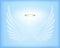 Transparent white angel wings with gold nimbus on sky blue background