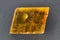 Transparent yellow orange rectangular optical calcite crystal Iceland spar stone