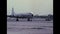 Transport airplane taxiing at a US military airfield in the 1960s