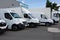 Transport dumont several cars vans and panel trucks parked in parking lot for rent