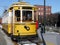 Transport: historic yellow trolley car side