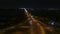 Transport interchange near Paton bridge, Kyiv, Ukraine. Night traffic aerial view
