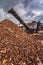 Transport of pine logs in a sawmill for processing and pellet processing