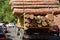 Transport stacked chopped wood logs renewable energy on flat back lorry truck