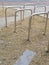 Transport, storage, security and safety concept - close up of fixed gear bicycle locked at street parking outdoors