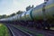 Transport tank car LNG by rail, gas - oil products. LPG transport propane. The fuel train, rolling stock with petrochemical tank