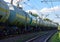 Transport tank car LNG by rail, gas - oil products. LPG transport propane. The fuel train, rolling stock with petrochemical tank