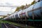 Transport tank car LNG by rail, gas - oil products. LPG transport propane. The fuel train, rolling stock with petrochemical tank