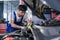 Transportation repair service concept, Repairman auto mechanic check for damage inside engine. man worker service engine mechanic