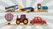 Transportation toys on wooden shelves