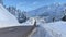 Transportation, traffic and magnificent views on mountainous roads in winter