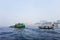 Transporting local people by small boats across the river, Commuter ferryboat in the monsoon, Boat ride in the Buriganga river.