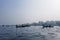 Transporting local people by small boats across the river, Commuter ferryboat in the monsoon, Boat ride in the Buriganga river.