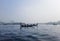 Transporting local people by small boats across the river, Commuter ferryboat in the monsoon, Boat ride in the Buriganga river.