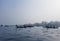 Transporting local people by small boats across the river, Commuter ferryboat in the monsoon, Boat ride in the Buriganga river.