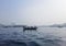 Transporting local people by small boats across the river, Commuter ferryboat in the monsoon, Boat ride in the Buriganga river.