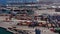 Transtainer yard, Aerial view of Shipping containers stacked by Mobile gantry cranes and Port traffic.