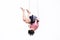 Trapeze artist hung upside down during her performance.