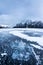 Trapped Gas Bubbles inside Frozen Lake Minnewanka in Banff