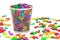 Trash bin full of colored letters, 3D rendering