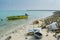 Trash and broken toilets on the tropical beach