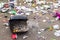 Trash left over after Mardi Gras Parade on St. Charles Avenue in New Orleans, LA, USA