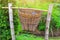 Trash made with bamboo basket, natural background  Garbage dumping concept