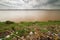 Trash On The Mekong River Bank In Thakhek Laos