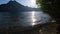 Traunsee lake, Upper Austria. Morning sunlight  blinking on water surface.