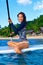 Travel Adventure. Woman Paddling On Surfing Board. Recreation, W