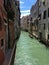 Travel along a canal in Venice, Italy