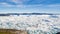 Travel in arctic landscape nature with icebergs - Greenland tourist man explorer