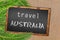 Travel Australia palm trees and blackboard on sandy beach