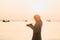 Travel background beautiful young women stand alone beach with s