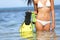 Travel beach fun concept - woman snorkeling fins