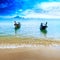 Travel boat on Thailand island beach. Tropical coast Asia landscape background