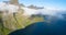 Travel concept with aerial panorama of Norwegian fiords with sea and mountains