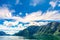 Travel concept. Amazing nature view with beautiful clouds above the fjord. Location: Lysefjorden, Norway, Europe. Artistic picture