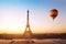 Travel concept, beautiful view of hot air balloon flying near Eiffel tower in Paris, France