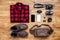 Travel concept boots, shirt, camera, mobilephone, bag, mp3,