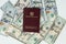 Travel concept, Colombian passport with dollar bills for travel abroad