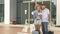 Travel concept. Loving couple checking tickets at airport